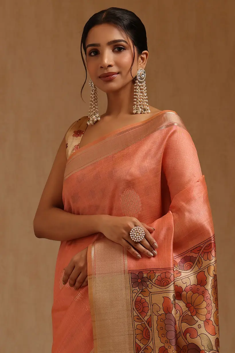 Peach Tussar Floral Zari Woven Saree